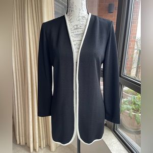 Vintage Nicole Studio cardigan size 6 NWOT 
The string from the tag is still on